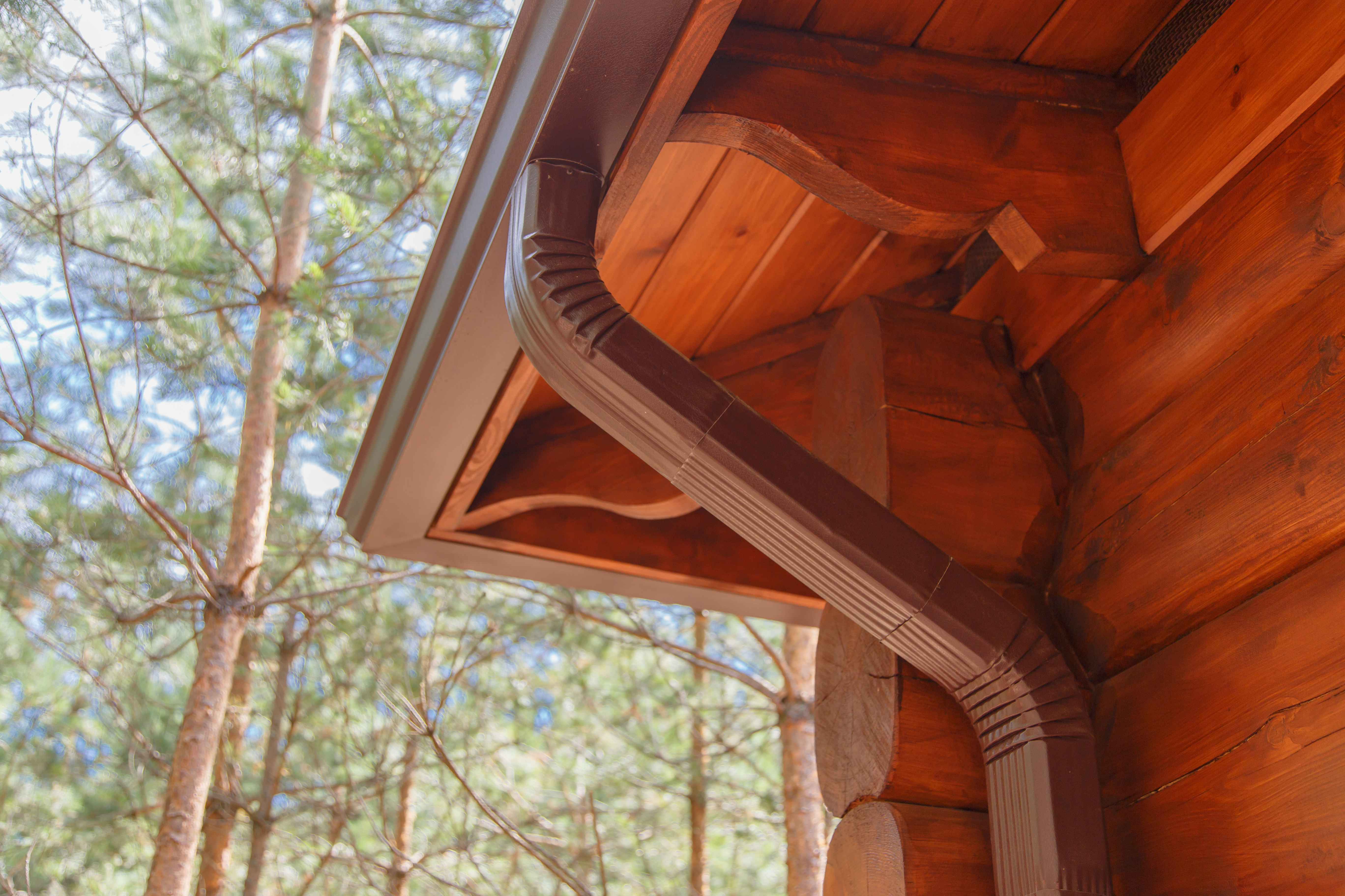 Copper gutter on wood cabin